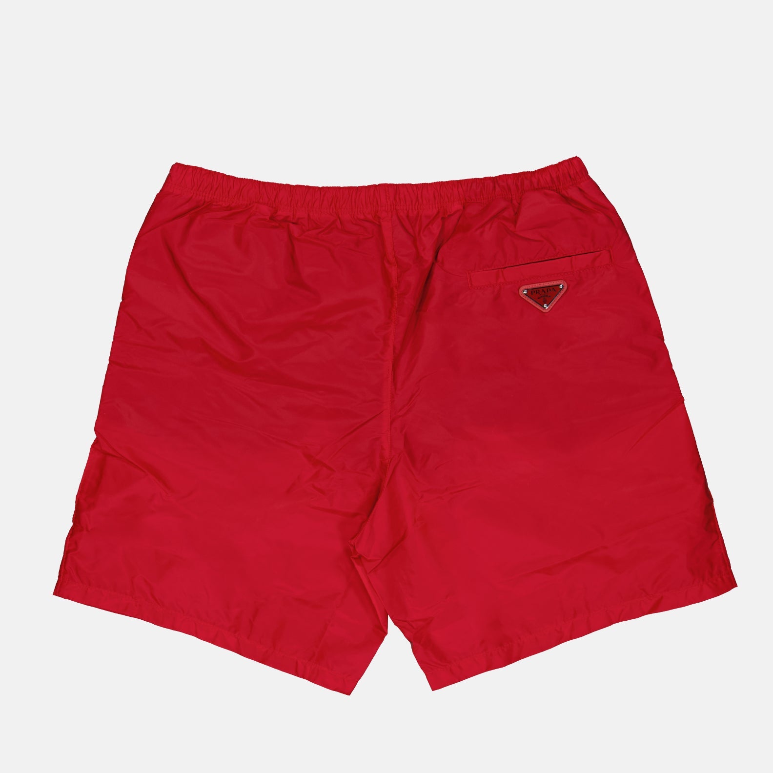 Prada swim trunks, men's luxury swimwear, red swim trunks, high-end beachwear, luxury swim trunks