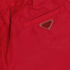 Prada swim trunks, men's luxury swimwear, red swim trunks, high-end beachwear, luxury swim trunks