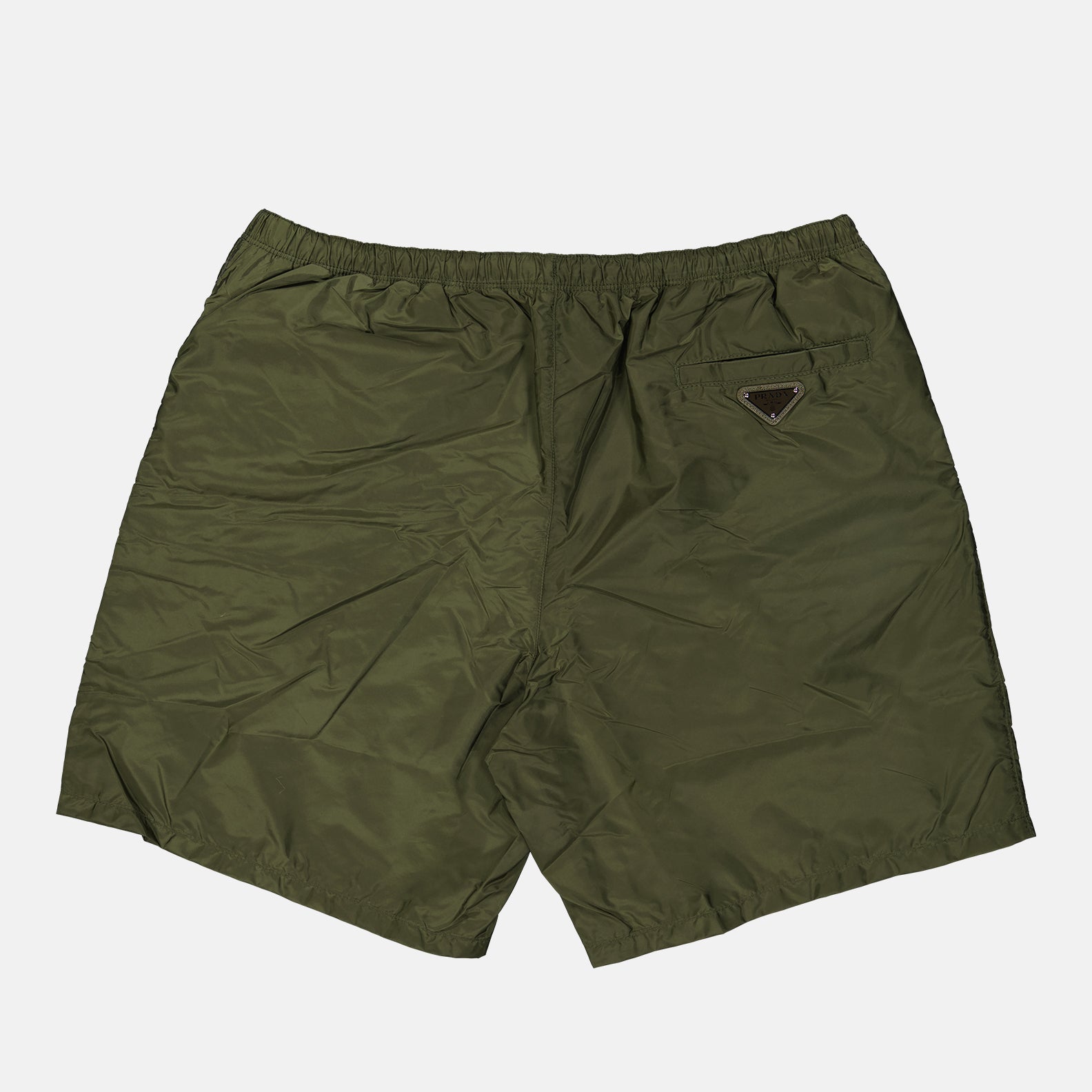 Prada swim shorts, luxury swimwear, men's beachwear, green swim shorts, designer swim shorts