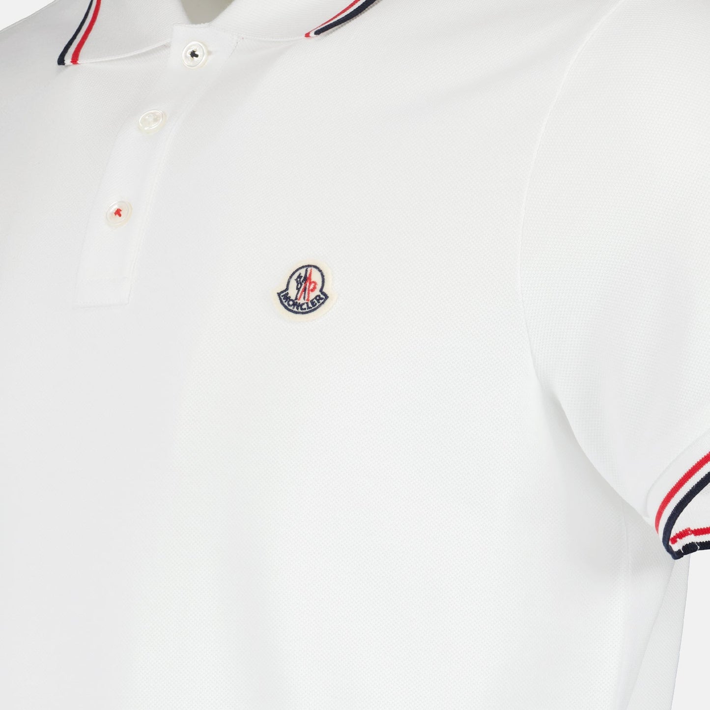 Moncler polo, luxury men's polo, designer white polo, embroidered logo shirt, elegant men's wear