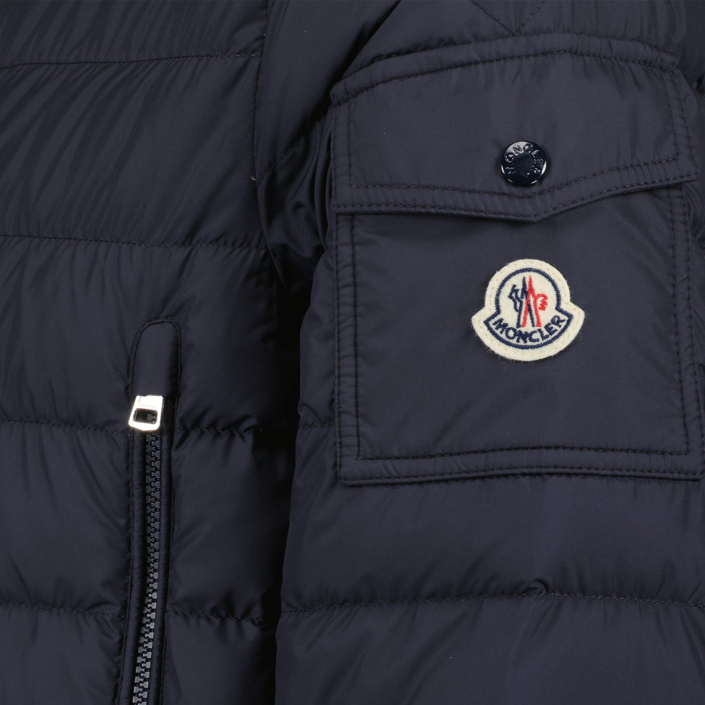 Moncler jacket, luxury men's outerwear, blue winter jacket, high-end fashion, designer men's clothing