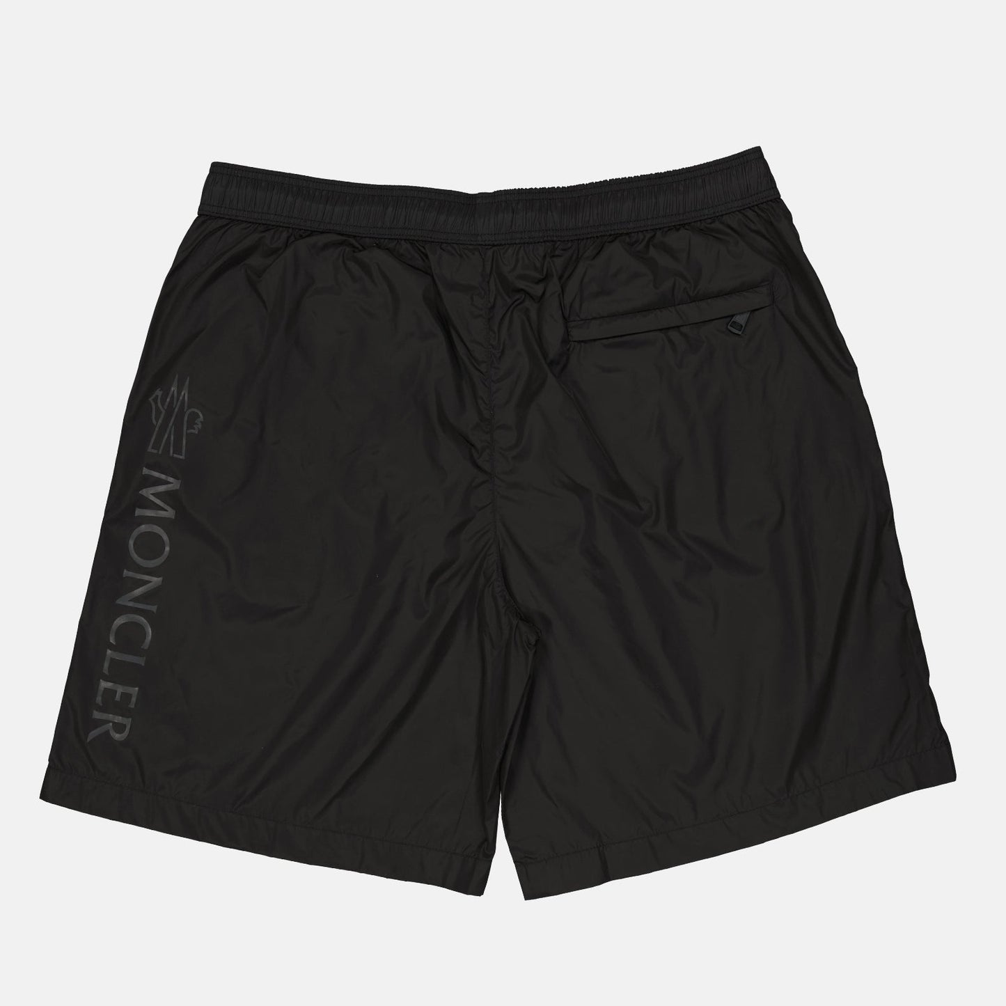 Moncler swim shorts, luxury swimwear, men's designer swimwear, black logo swim shorts, high-end beachwear