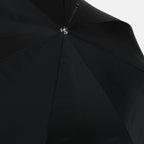 luxury umbrella, Alexander McQueen accessories, black skull umbrella, high-end fashion, designer umbrella