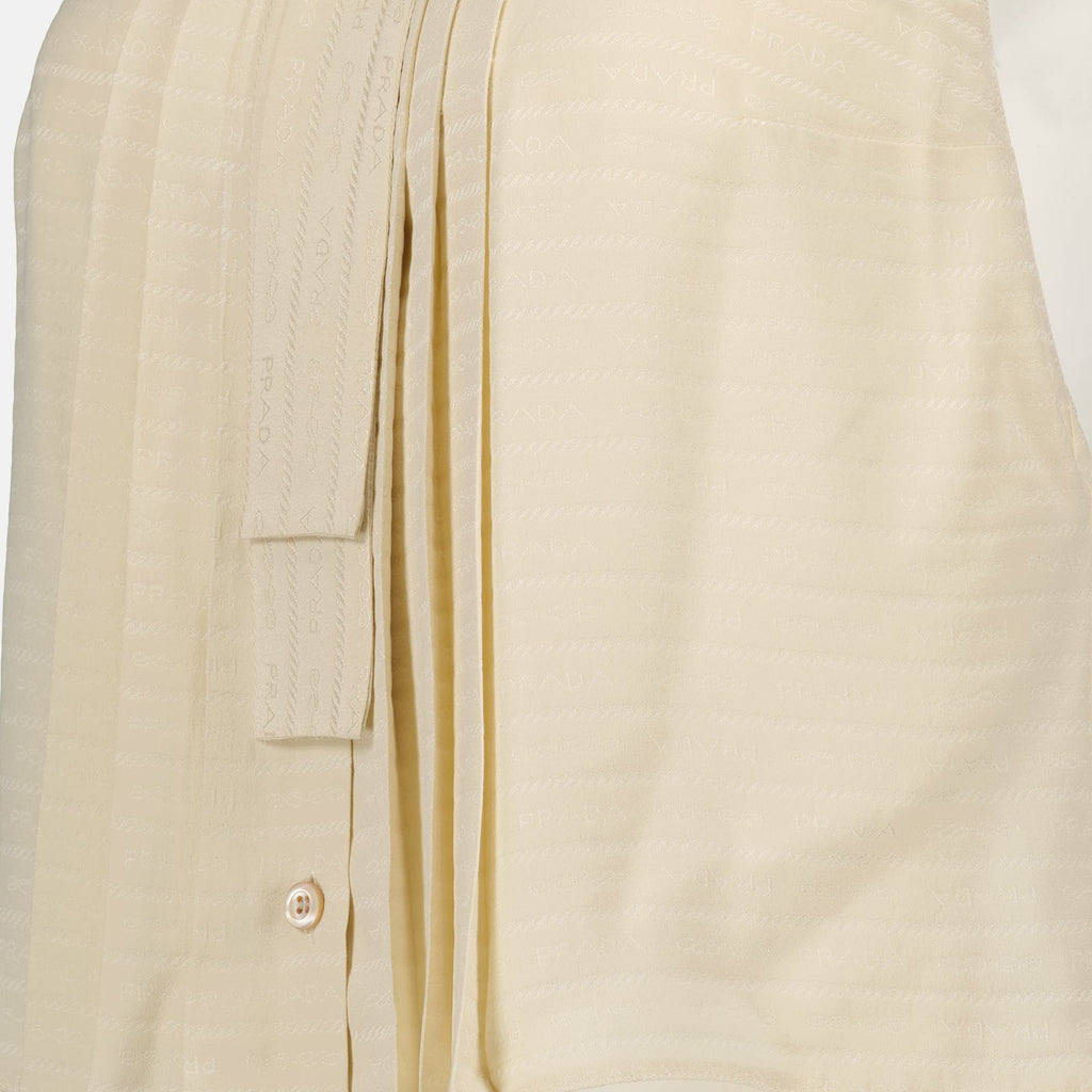Prada womenswear, sleeveless silk shirt, luxury fashion, designer clothing, elegant wardrobe