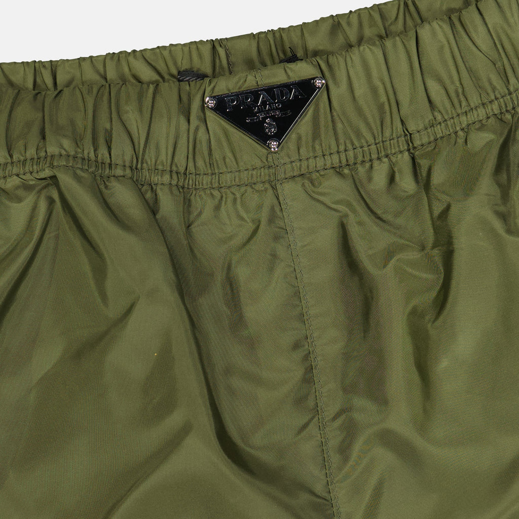 Prada swim shorts, green swim shorts, luxury beachwear, designer swimwear, men's fashion