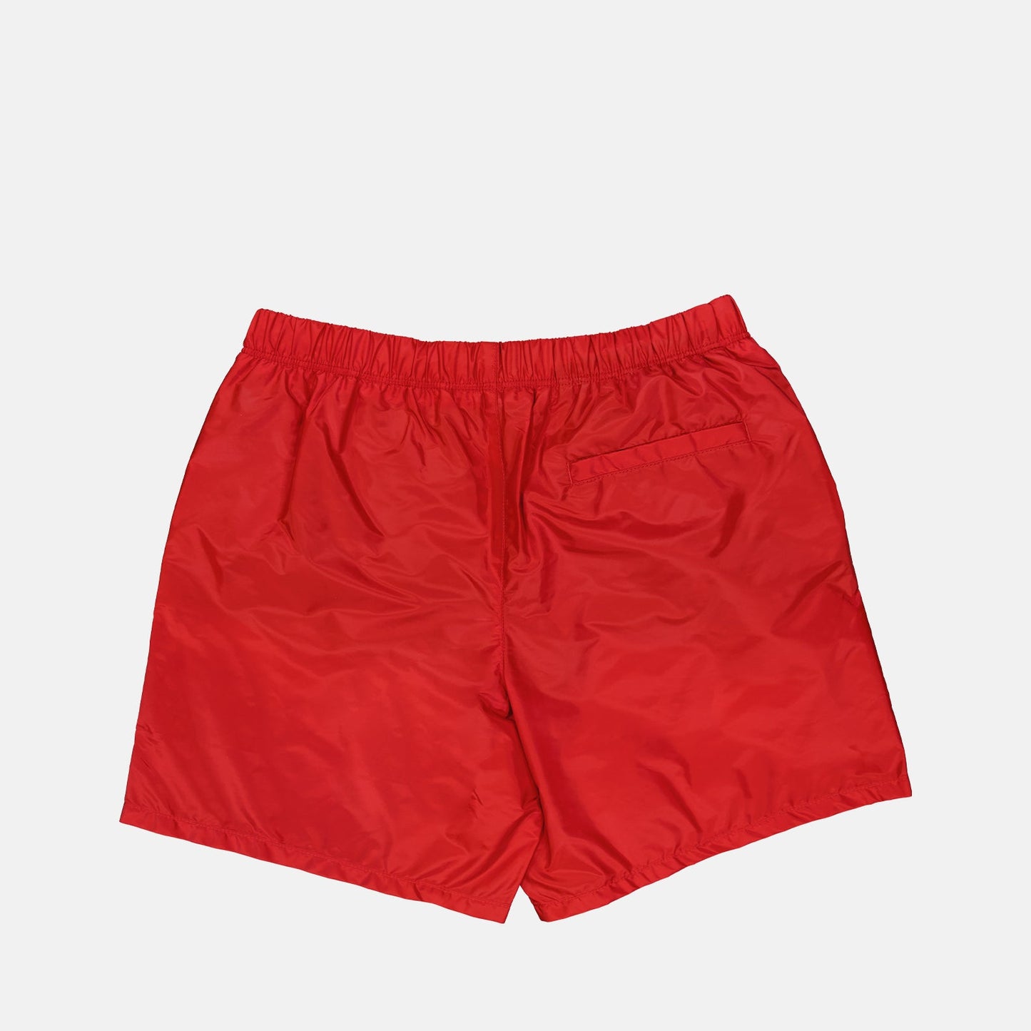 Prada swim shorts, red swimwear, luxury swimwear, designer beachwear, logo swim shorts