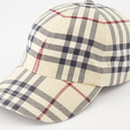 Burberry, vintage cap, checkered cap, luxury accessory, timeless style