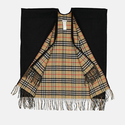 black wool poncho, Burberry checkered poncho, luxury outerwear, high-end fashion poncho, timeless wool poncho