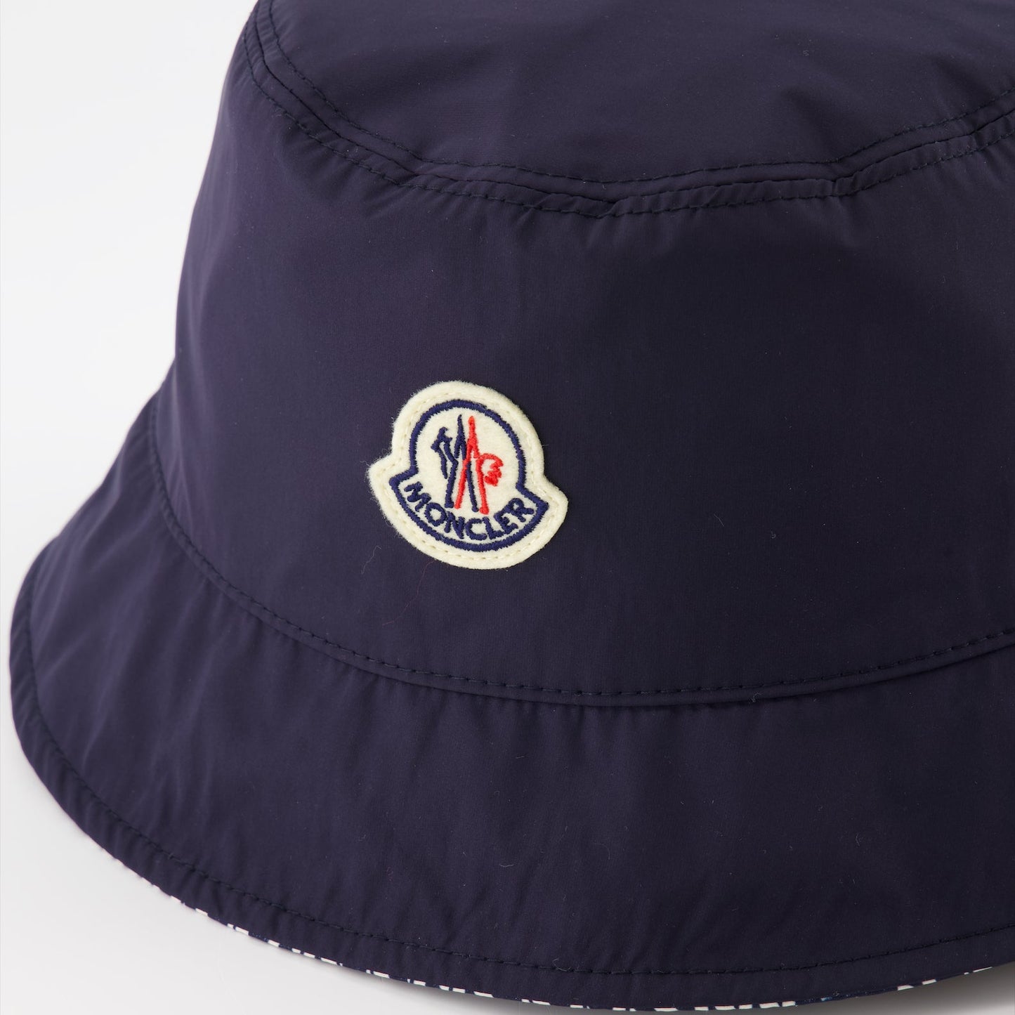 reversible bucket hat, blue bucket hat, Moncler accessories, luxury hat, high-end fashion