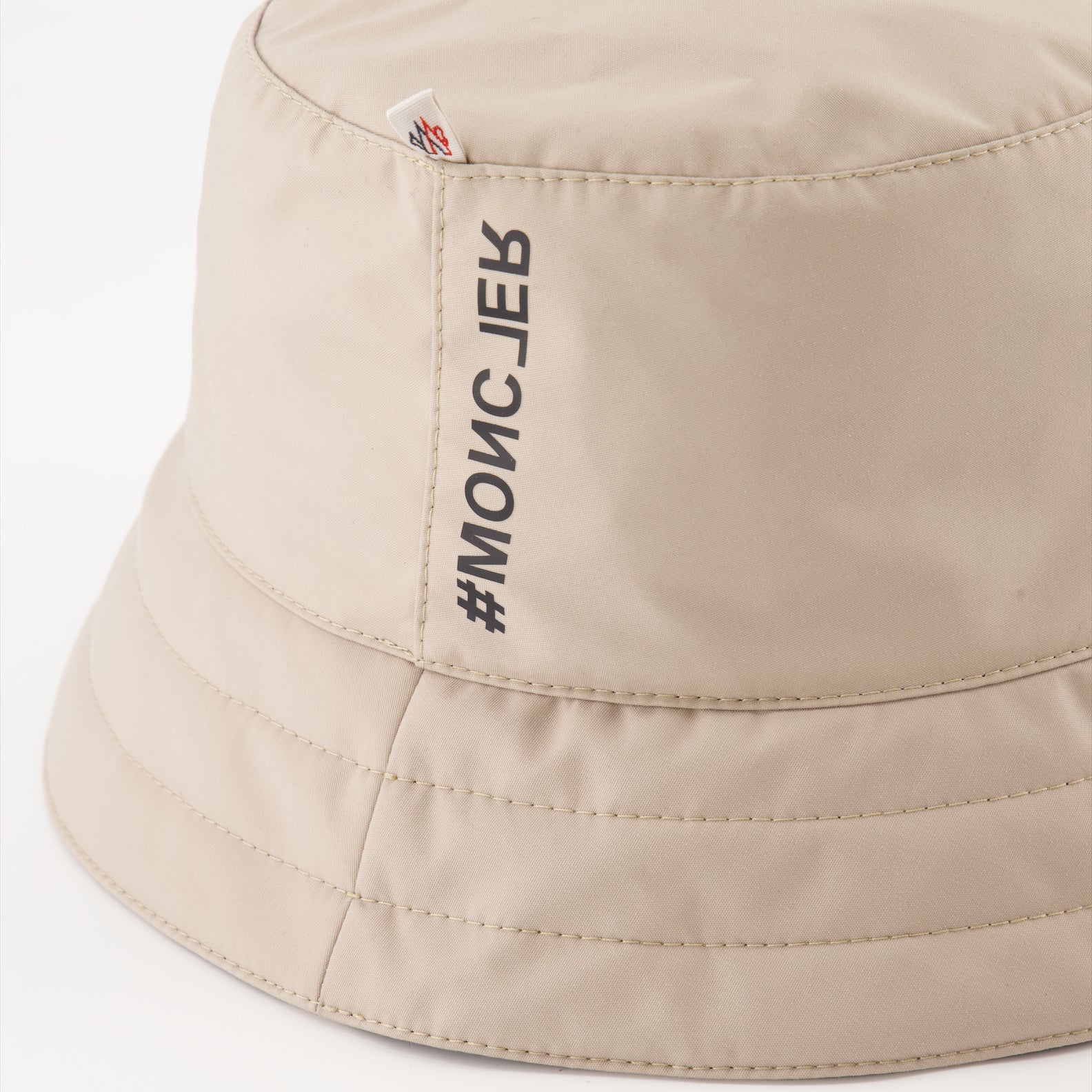 Moncler Grenoble, beige nylon bucket hat, luxury accessory, high-end headwear, fashionable hat