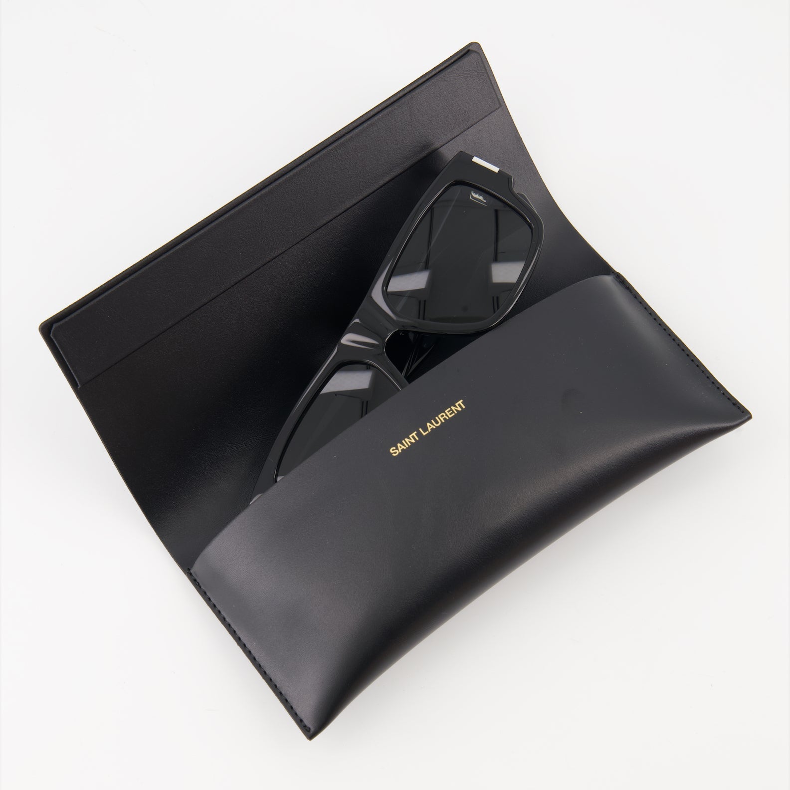 luxury sunglasses, Saint Laurent, unisex sunglasses, black frame shades, high-end eyewear