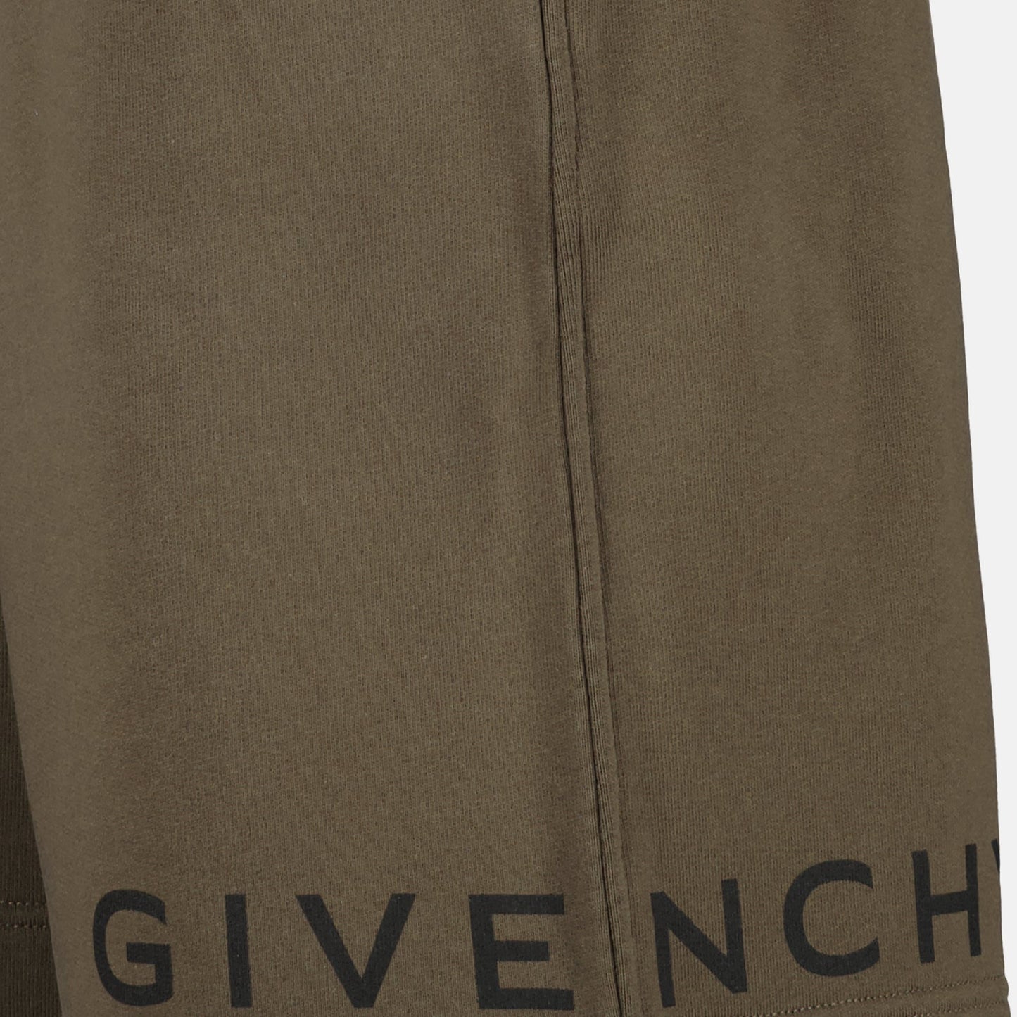 Givenchy shorts, green cotton shorts, luxury casual wear, designer shorts, sophisticated men’s clothing