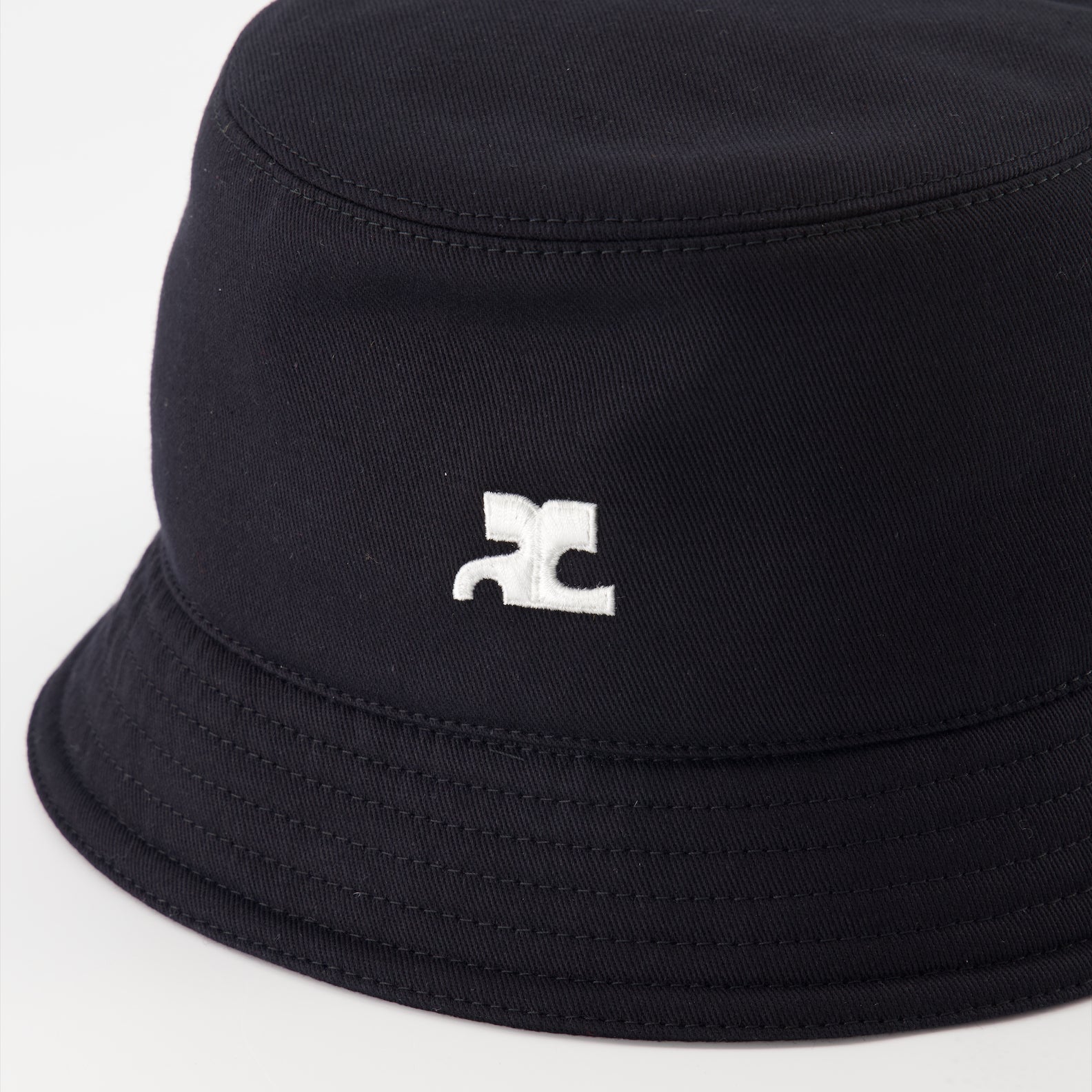 Black bucket hat, Courrèges accessories, luxury bucket hat, cotton bucket hat, elegant headwear