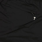 luxury swimwear, black nylon swim shorts, AMI Paris swim shorts, Ami de Coeur logo, designer swimwear