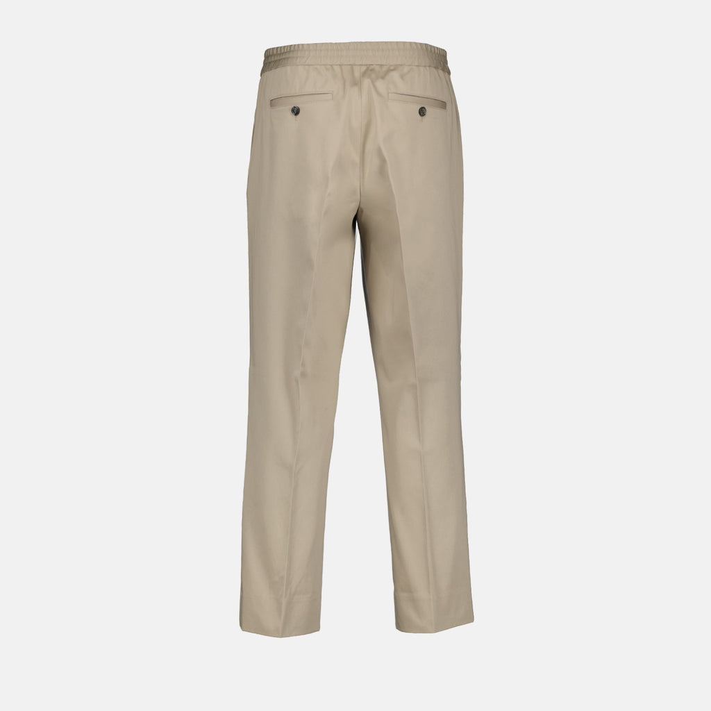 Beige cotton pants, luxury men's wear, AMI Paris trousers, high-end fashion, refined elegance
