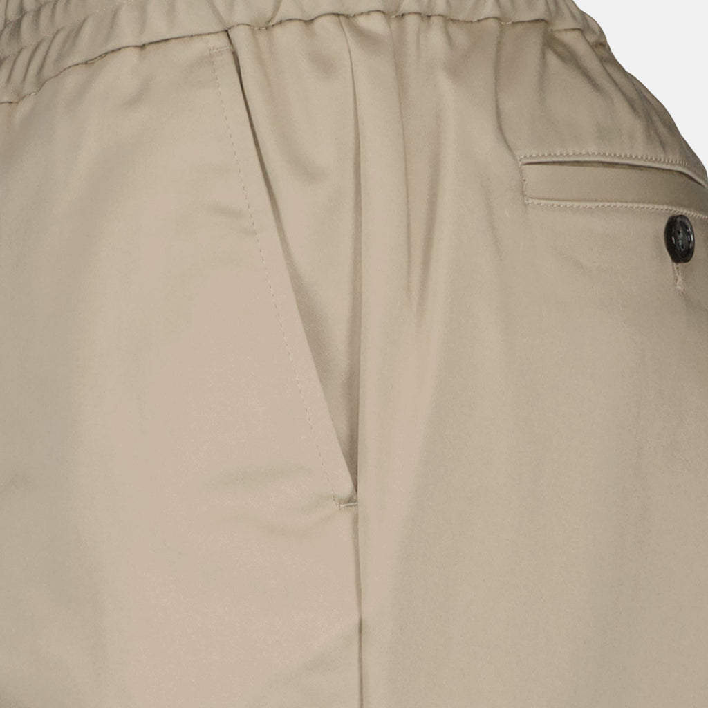 Beige cotton pants, luxury men's wear, AMI Paris trousers, high-end fashion, refined elegance