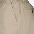 Beige cotton pants, luxury men's wear, AMI Paris trousers, high-end fashion, refined elegance