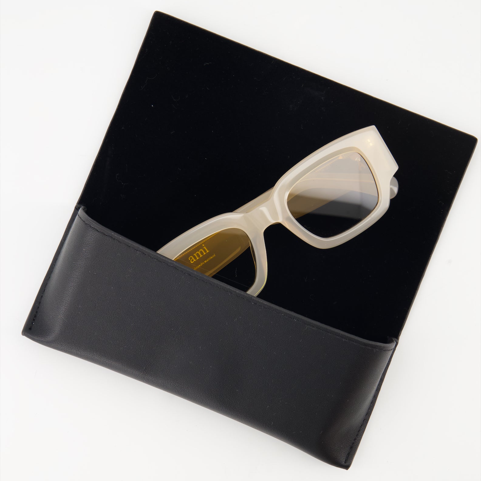 luxury sunglasses, beige sunglasses, AMI Paris, designer eyewear, unisex sunglasses