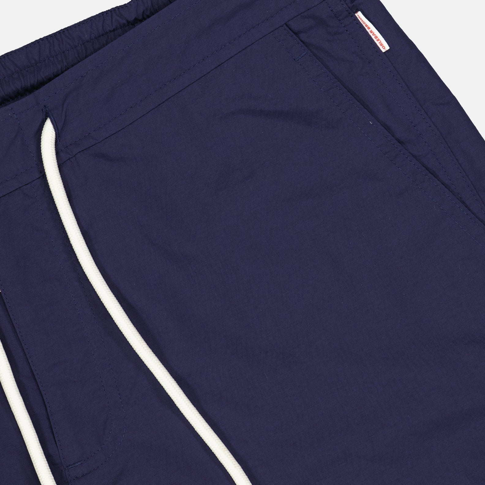 luxury swimwear, Orlebar Brown, men's swim shorts, blue swimwear, high-end beachwear