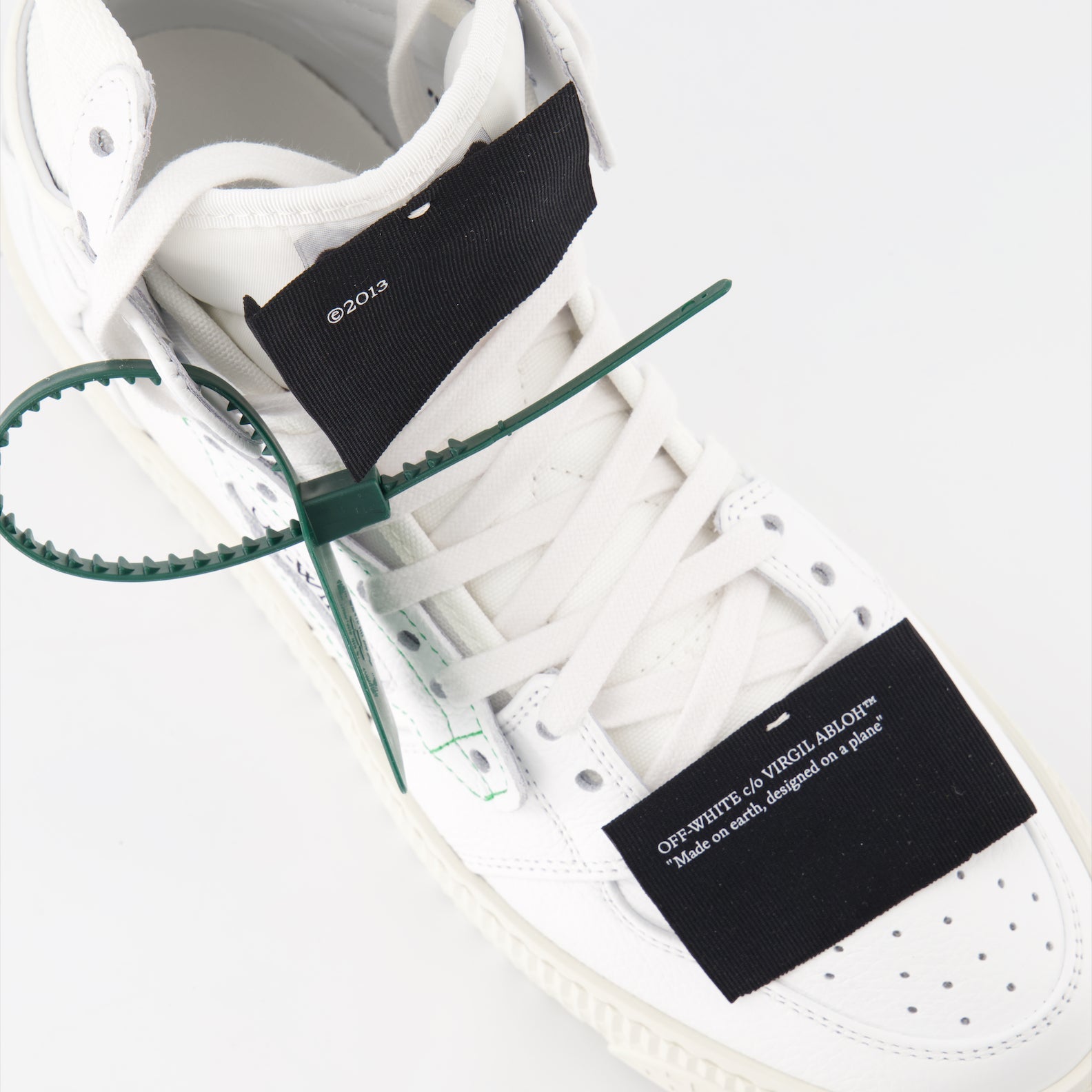 Off-White sneakers, luxury leather sneakers, high-top fashion shoes, streetwear luxury, designer footwear