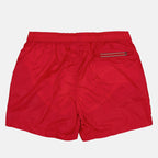 red logo swim shorts, Moncler swimwear, luxury swim shorts, designer swimwear, summer essentials