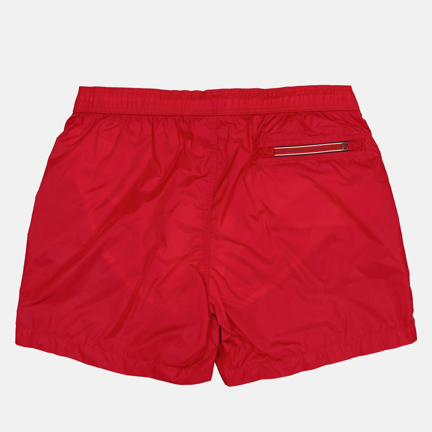 red logo swim shorts, Moncler swimwear, luxury swim shorts, designer swimwear, summer essentials