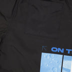 luxury swimwear, black swim shorts, Off-White swimwear, high-end beachwear, designer swim shorts