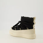 Image of Moncler Padded Winter Boots by Moncler for Women - Season Fall - Winter 2025 - Back Right Three-Quarter View
