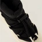 Image of Moncler Padded Winter Boots by Moncler for Women - Season Fall - Winter 2025 - Top Detail View