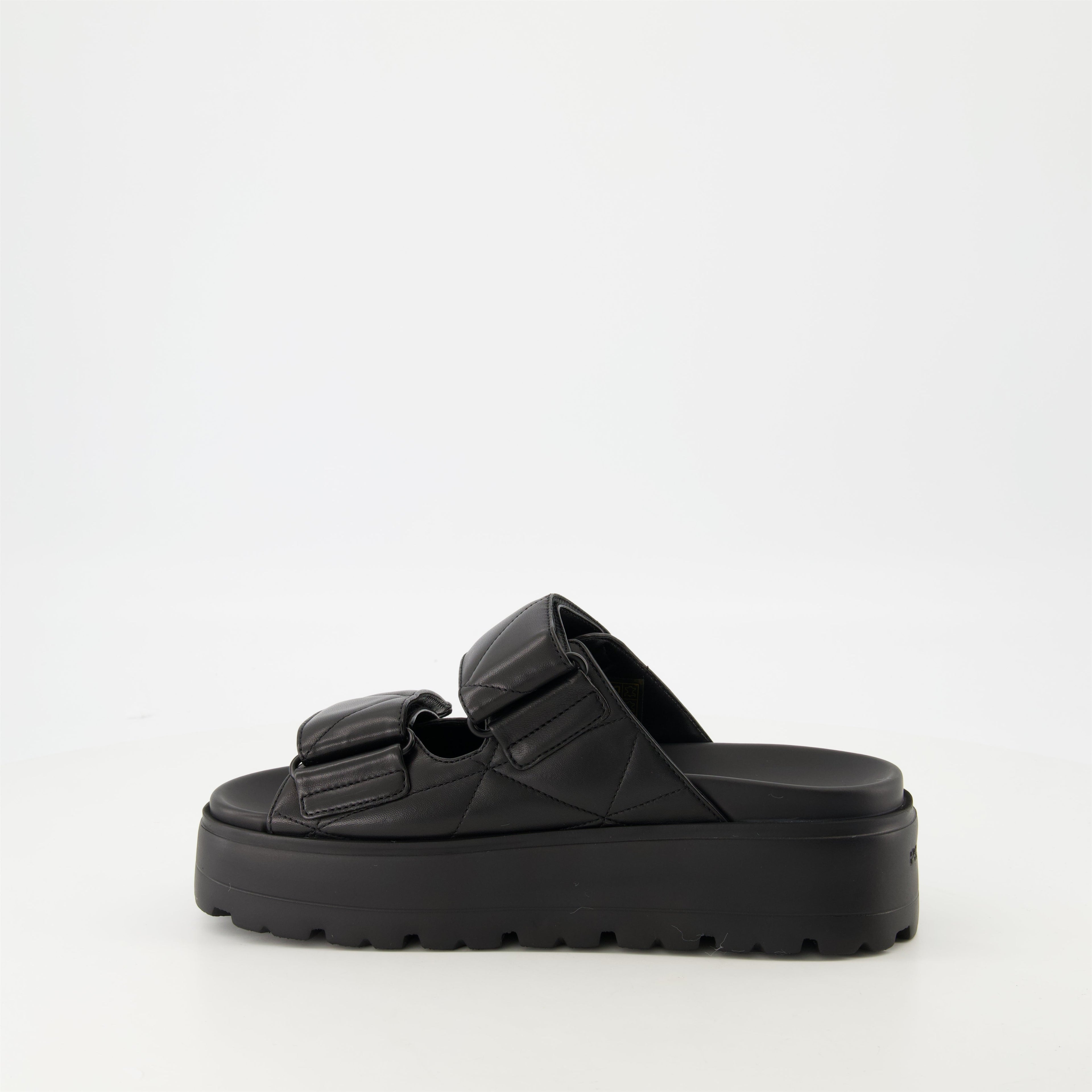 black mules, nappa leather footwear, quilted mules, Prada footwear, women's mules