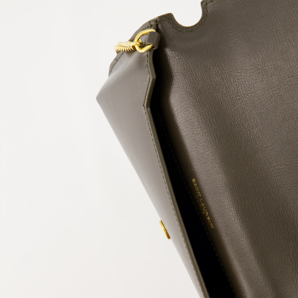 Saint Laurent phone pouch, khaki leather accessory, smooth calf leather pouch, Fall-Winter 2025 collection, detachable shoulder strap
