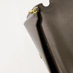 Saint Laurent phone pouch, khaki leather accessory, smooth calf leather pouch, Fall-Winter 2025 collection, detachable shoulder strap