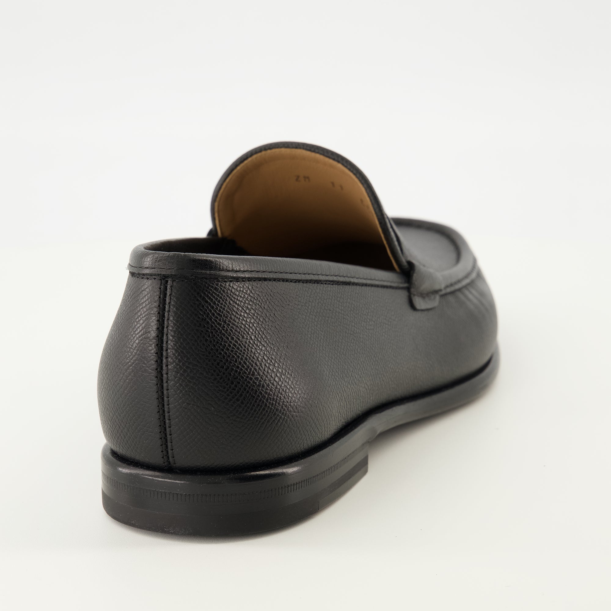 Image of Black Leather Loafers by Ferragamo for Men - Season Spring-Summer 2026 - Back View
