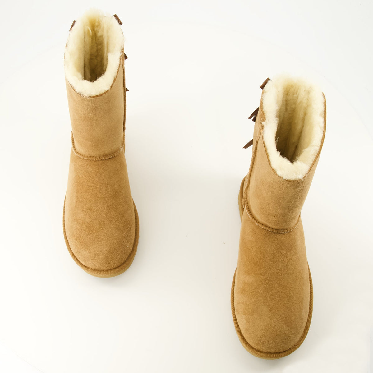 Botas Bailey Bow II em pele de borrego