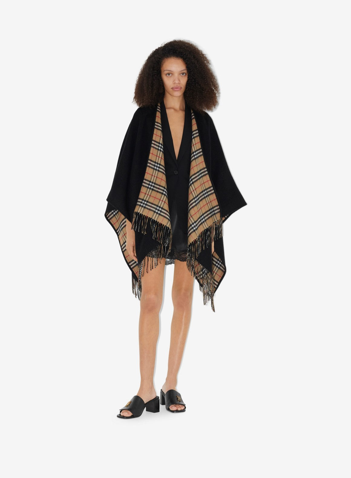 black wool poncho, Burberry checkered poncho, luxury outerwear, high-end fashion poncho, timeless wool poncho