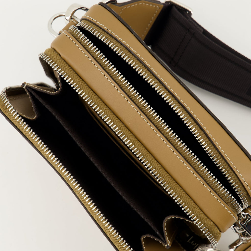 Fendi mini bag, brown leather bag, FF print bag, adjustable strap bag, luxury accessories