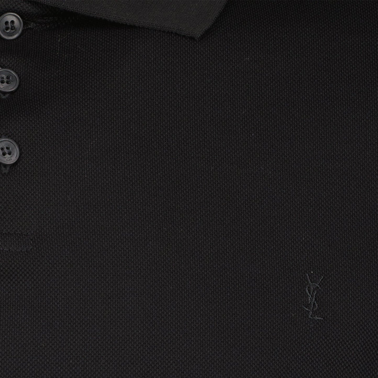 black polo shirt, embroidered emblem polo, classic polo design, cotton polyester blend, Saint Laurent AW2024