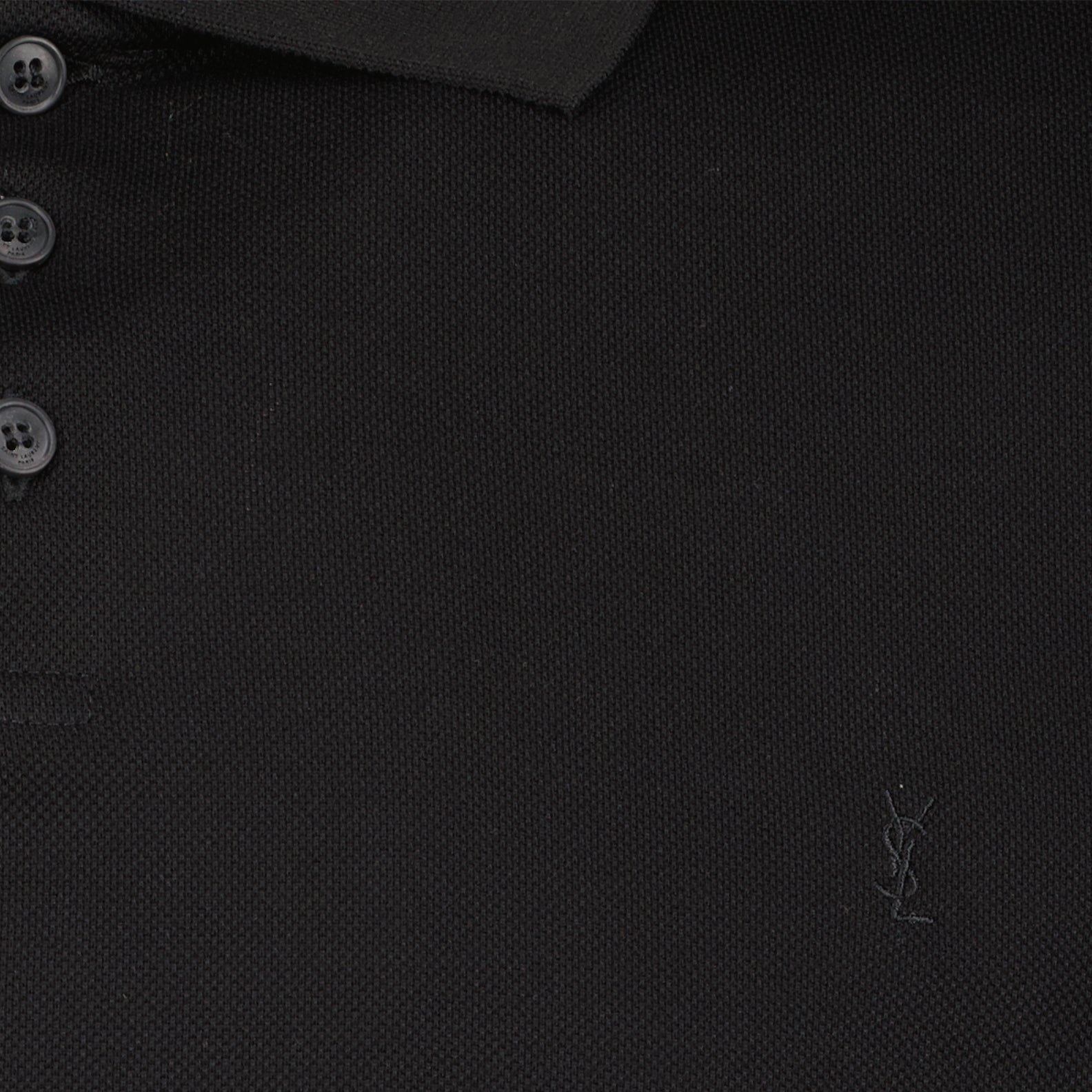 black polo shirt, embroidered emblem polo, classic polo design, cotton polyester blend, Saint Laurent AW2024