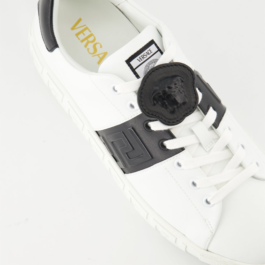 Versace sneakers, Greca design, black and white sneakers, smooth leather footwear, luxury casual shoes