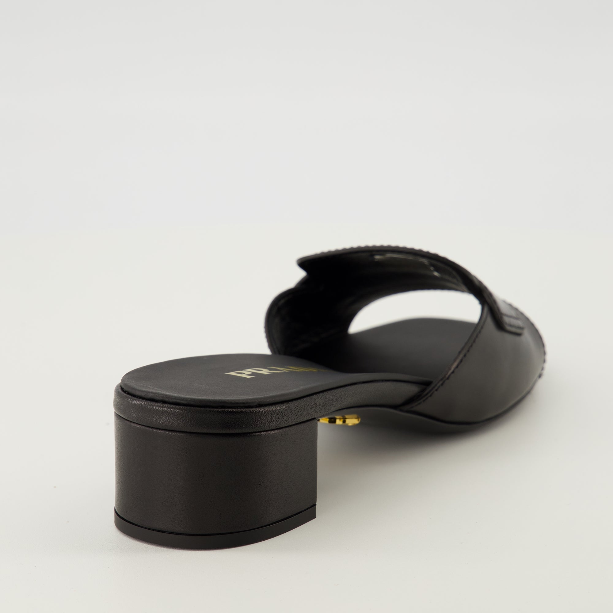 black leather mules, Prada footwear, Spring-Summer 2026 collection, square toe mules, luxury footwear