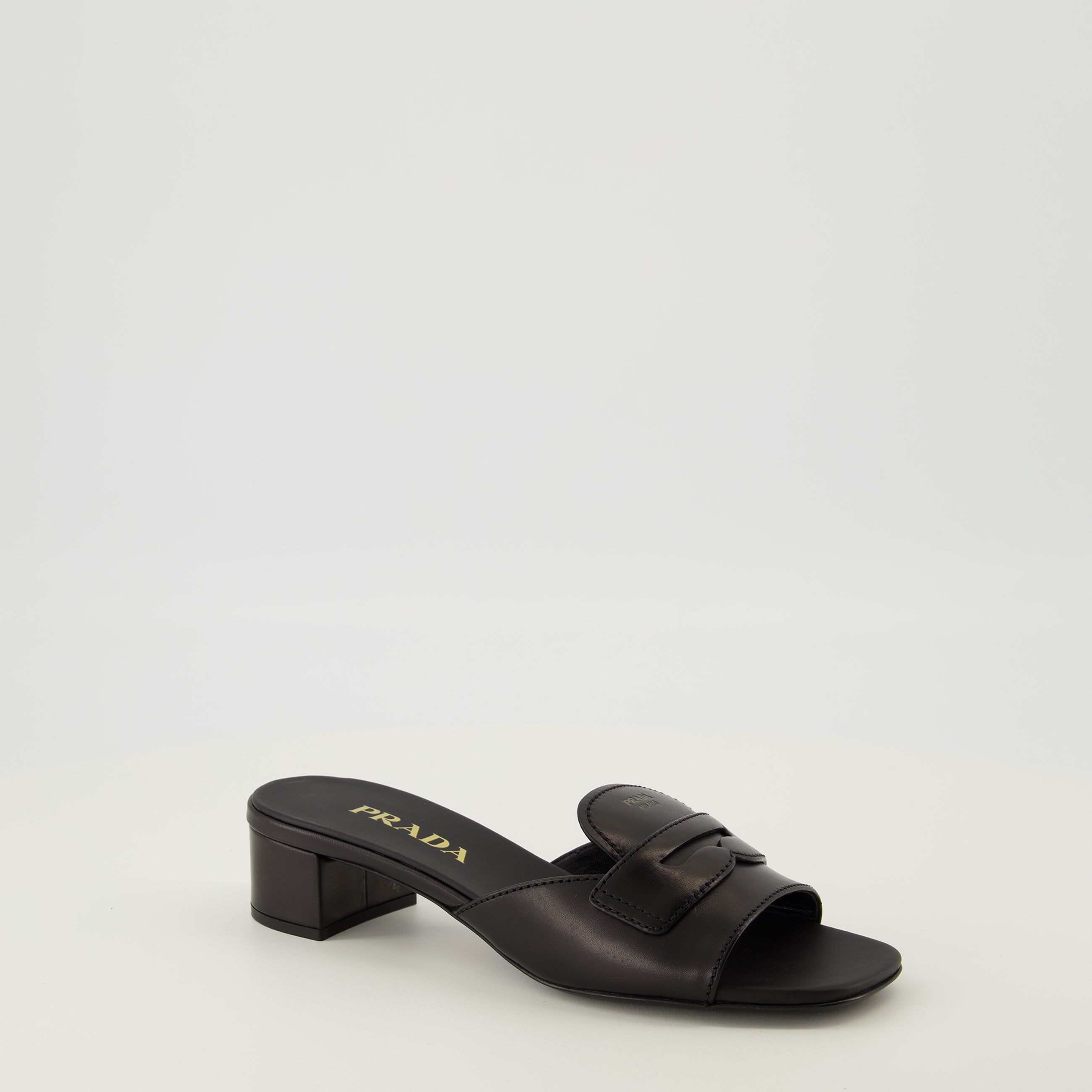 black leather mules, Prada footwear, Spring-Summer 2026 collection, square toe mules, luxury footwear