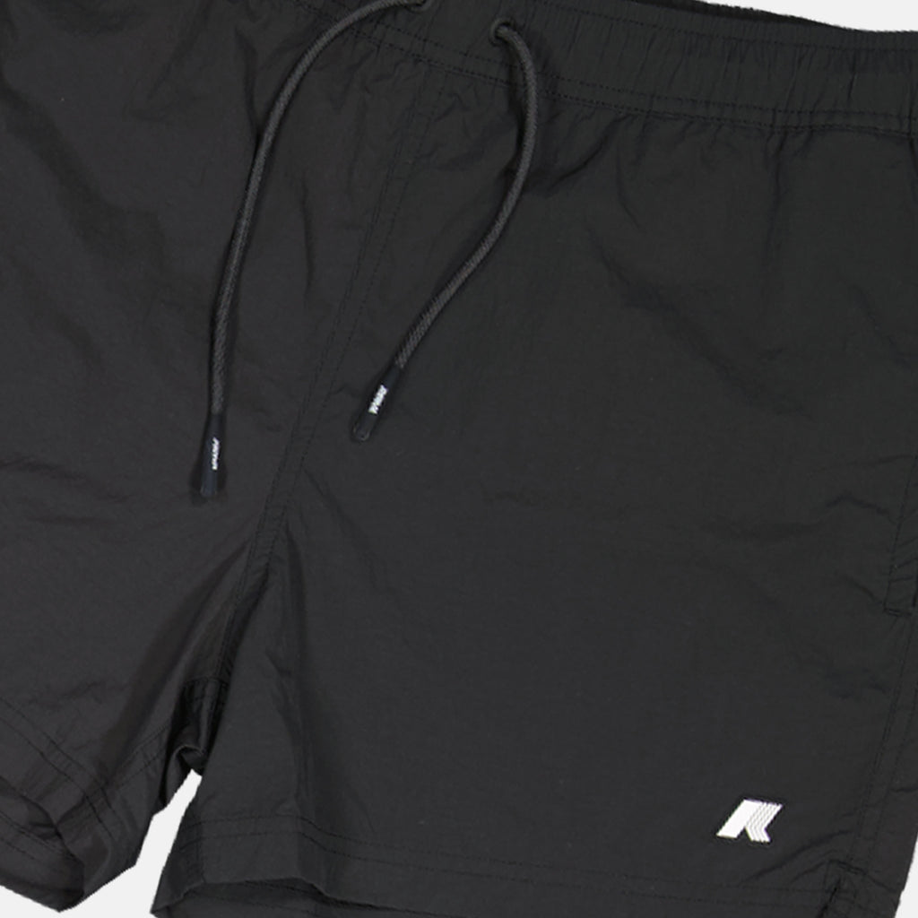 swim shorts, seersucker fabric, black swimwear, practical pockets, summer essentials