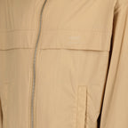 Image of Beige Windbreaker by Ami PARIS for Unisex - Season Autumn-Winter 2024 - Detail View 5