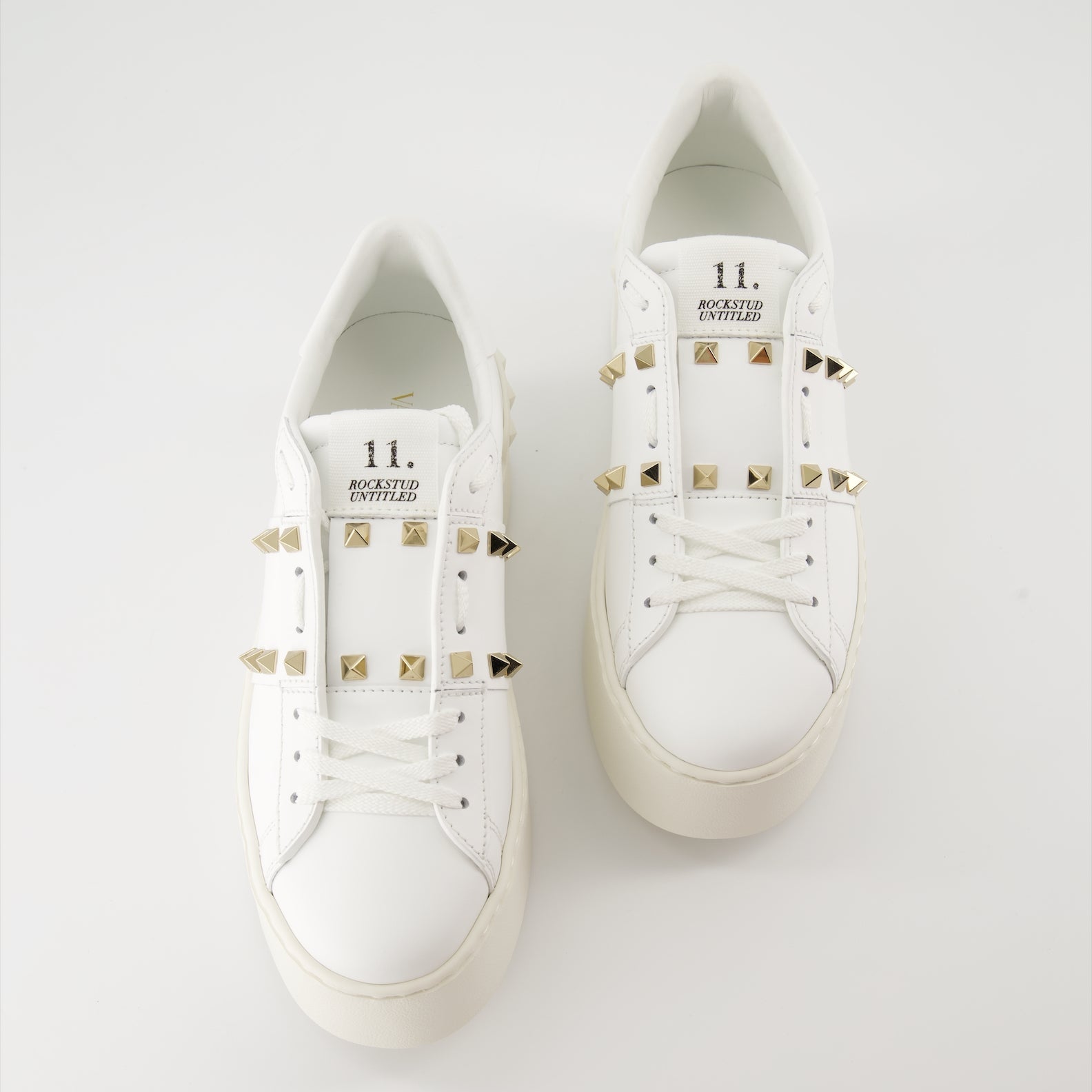 luxurious sneakers, Valentino Garavani, white leather shoes, Rockstud sneakers, flatform sneakers