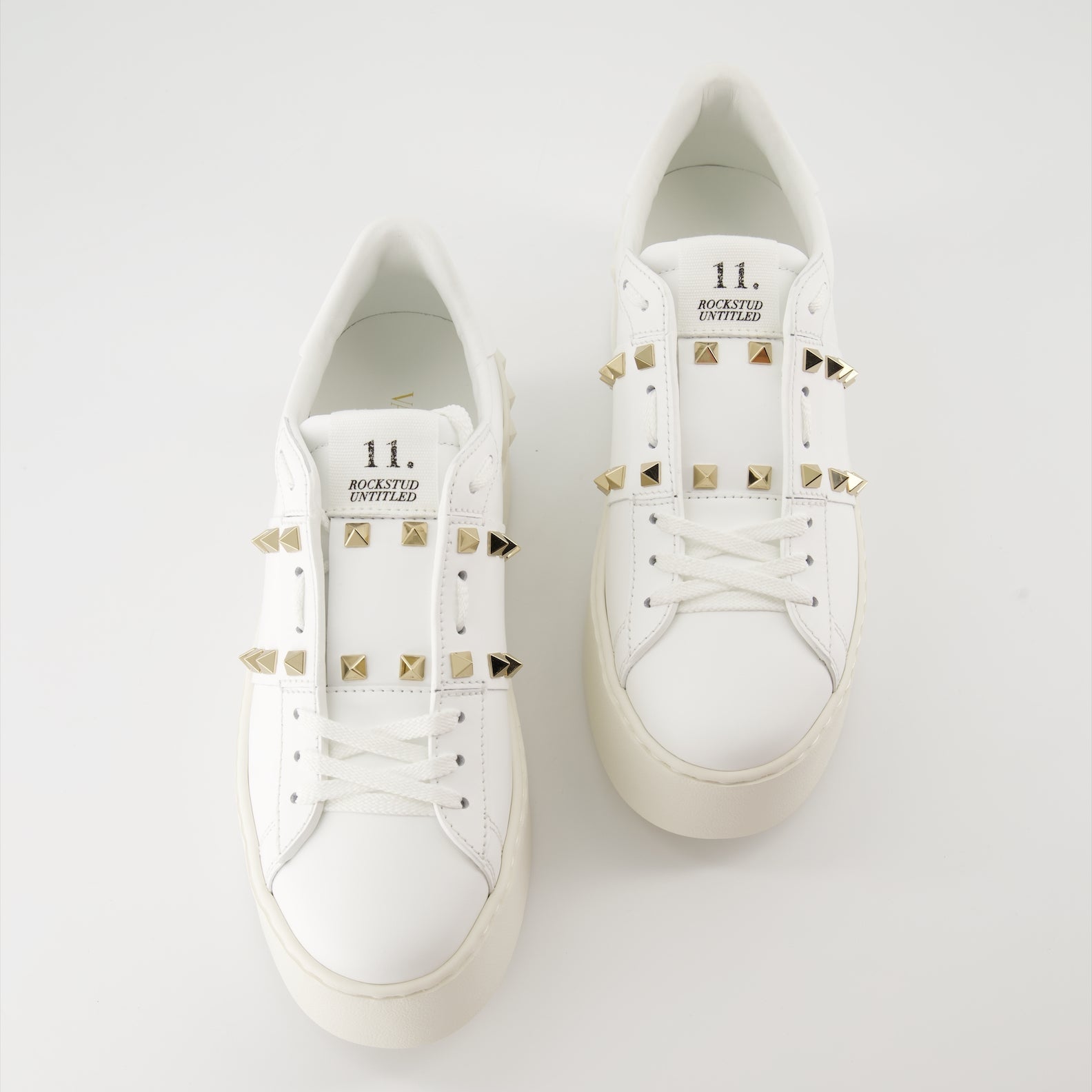 luxurious sneakers, Valentino Garavani, white leather shoes, Rockstud sneakers, flatform sneakers