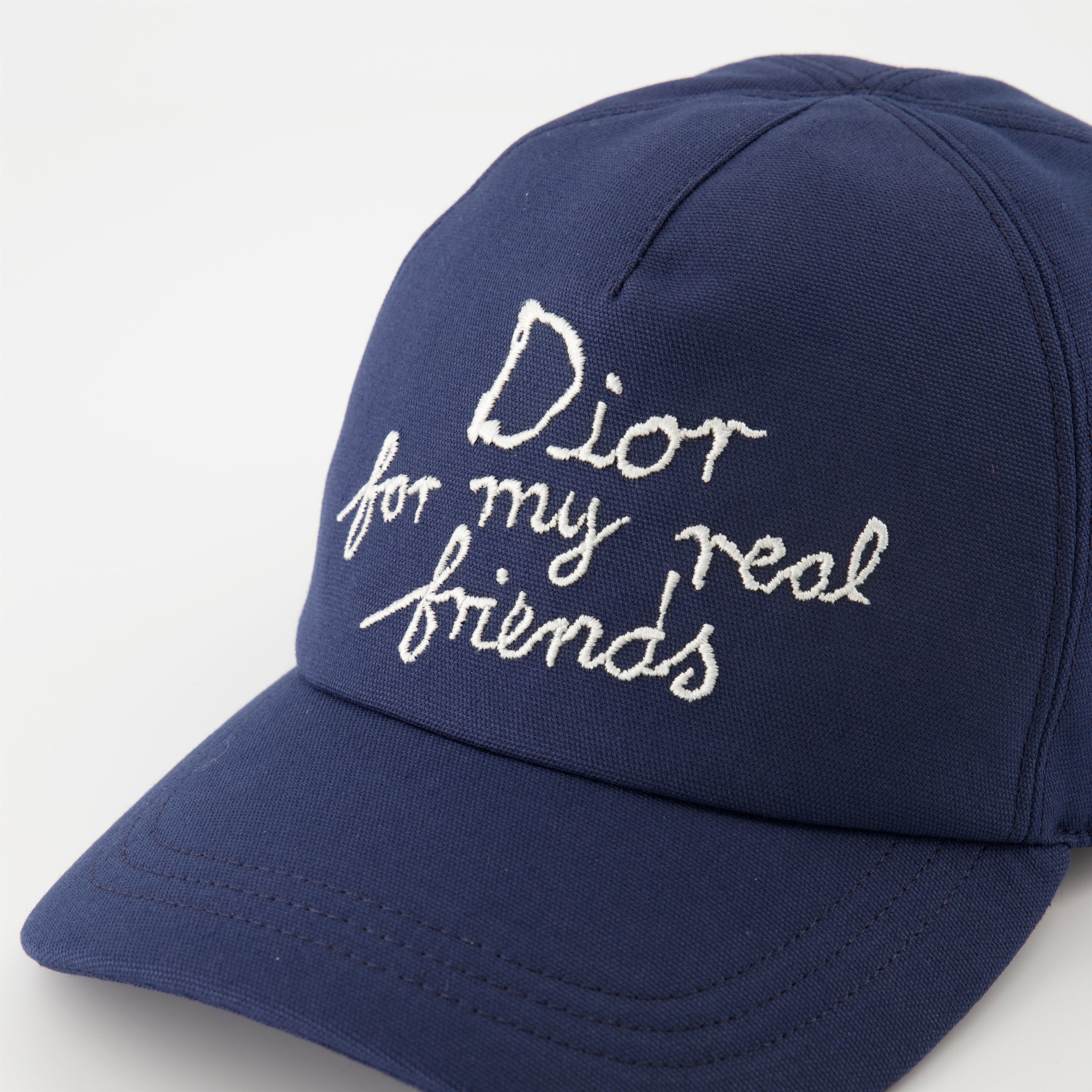 blue cap, Dior collaboration, embroidered logo, adjustable hat, cotton accessory