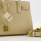 beige day bag, Saint Laurent bag, grained leather bag, designer accessories, elegant handbag