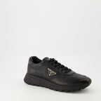 Prada sneakers, black leather sneakers, Prax 01 model, men's footwear, luxury menswear