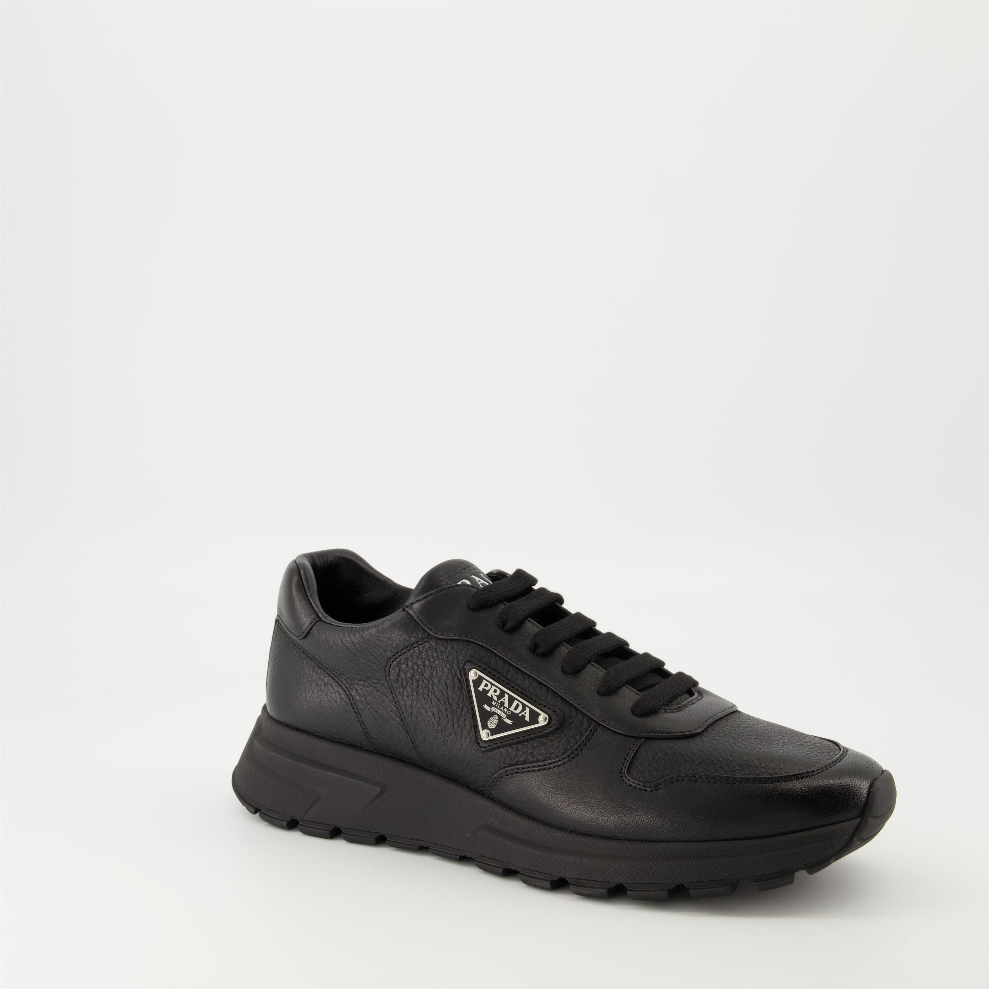 Prada sneakers, black leather sneakers, Prax 01 model, men's footwear, luxury menswear