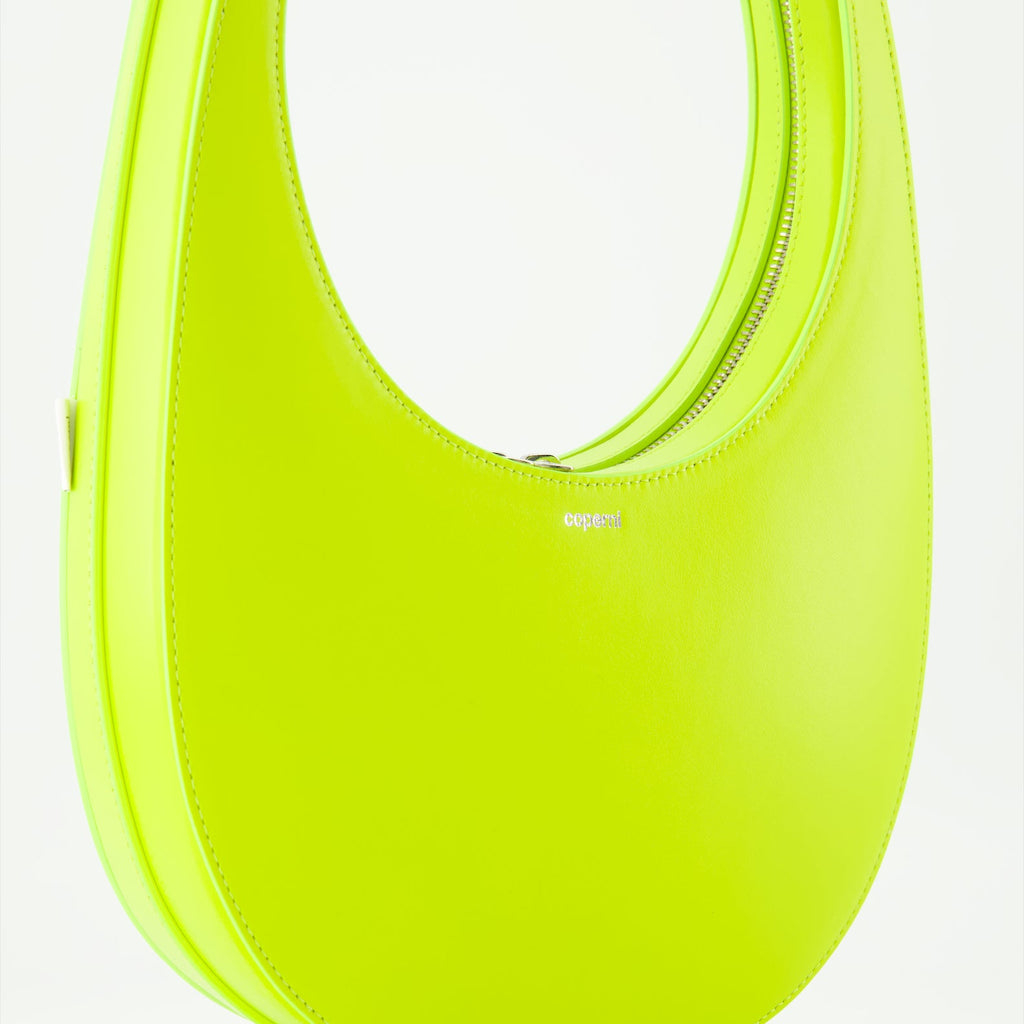 Coperni leather bag, black leather handbag, luxury swipe bag, designer accessories, avant-garde fashion